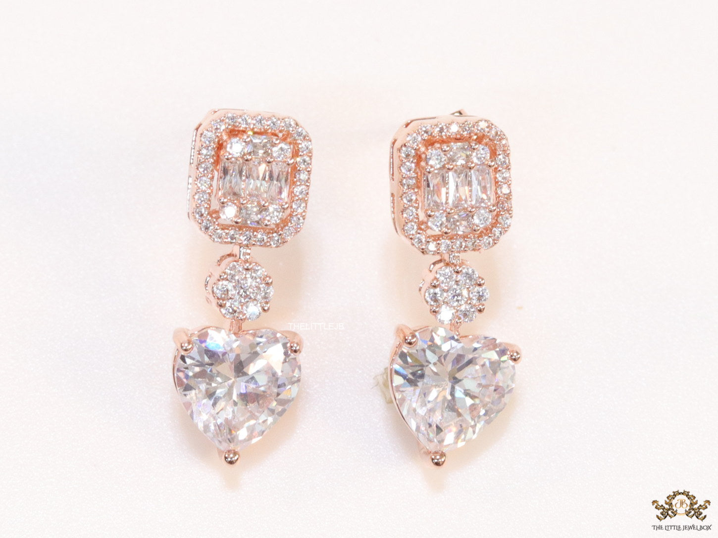 Rose gold Cz baguette earrings with heart shape cz drop
