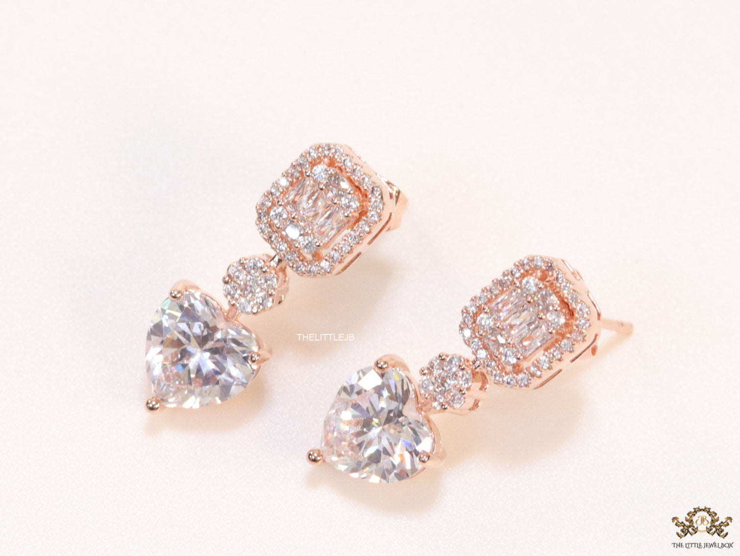 Rose gold Cz baguette earrings with heart shape cz drop