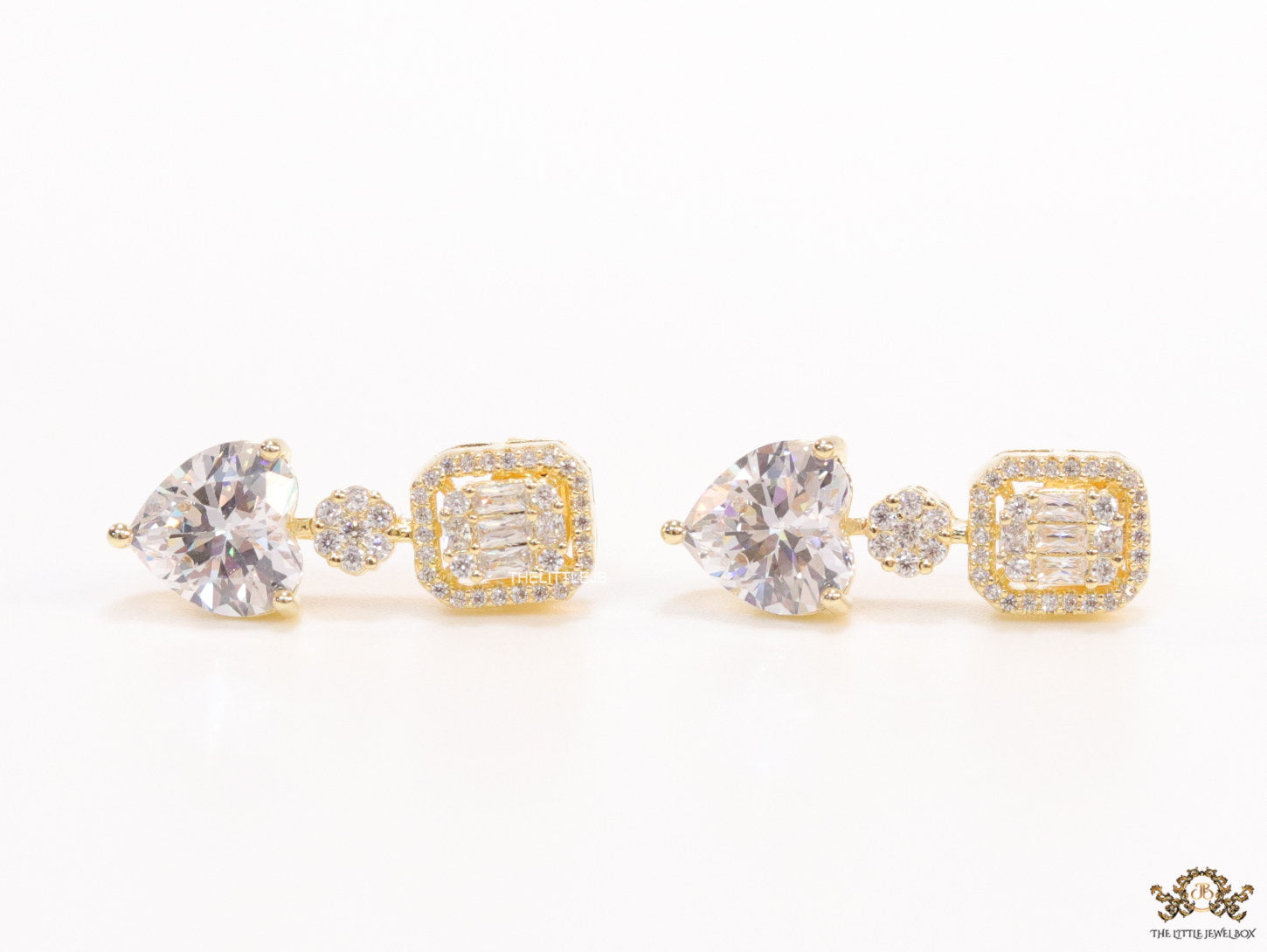 Golden cz baguette earrings with heart shape cz drop