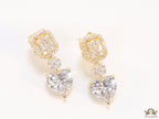 Golden cz baguette earrings with heart shape cz drop