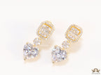 Golden cz baguette earrings with heart shape cz drop
