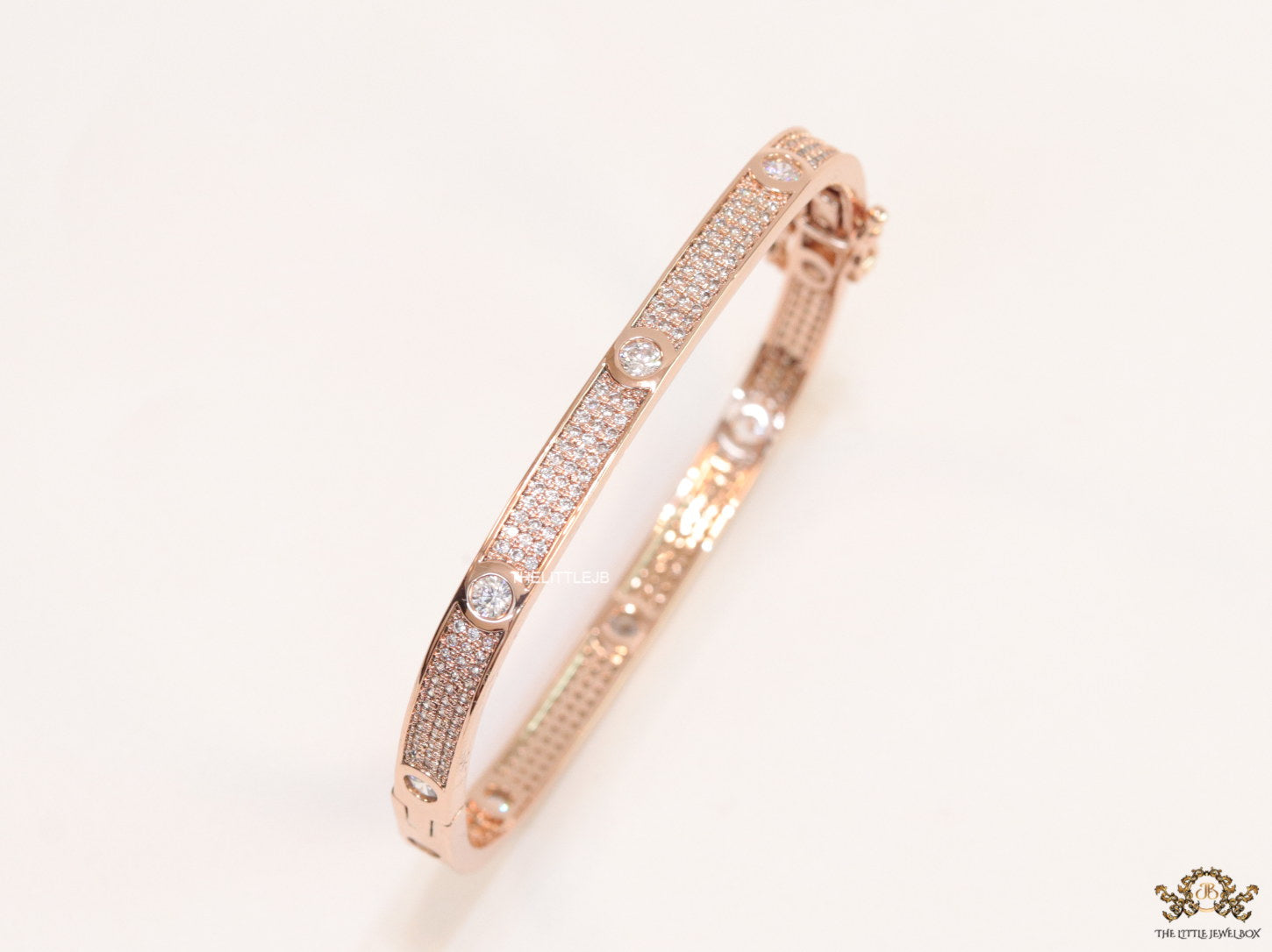 Rose Gold plated openable bracelet studded with cz