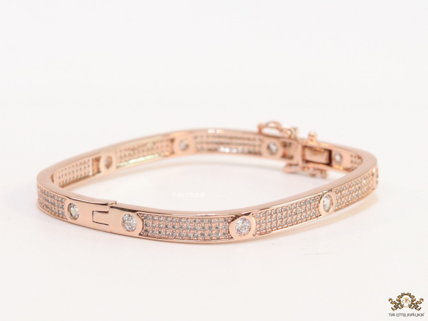 Rose Gold plated openable bracelet studded with cz