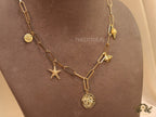 Gold plated link chain necklace with charms- snake, star fish, saturn, snail shell, Sun n Moon