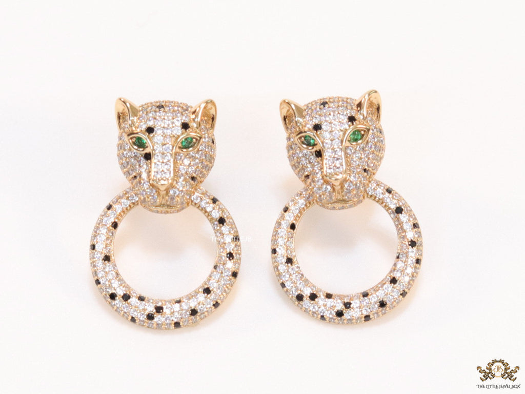 Cz panther face with ring studs in golden finish