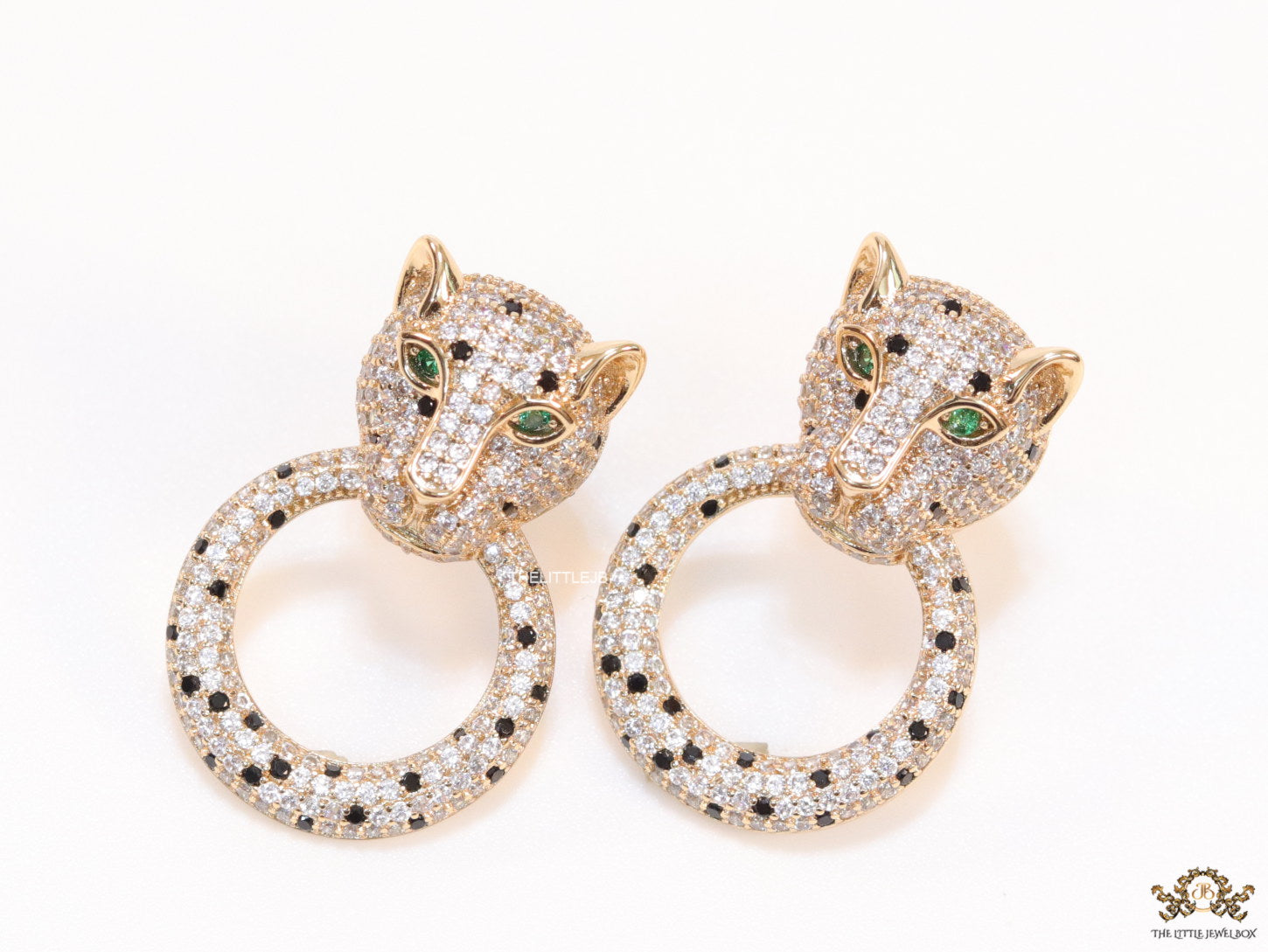 Cz panther face with ring studs in golden finish