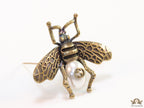 Antique gold finish alphabet bee brooch