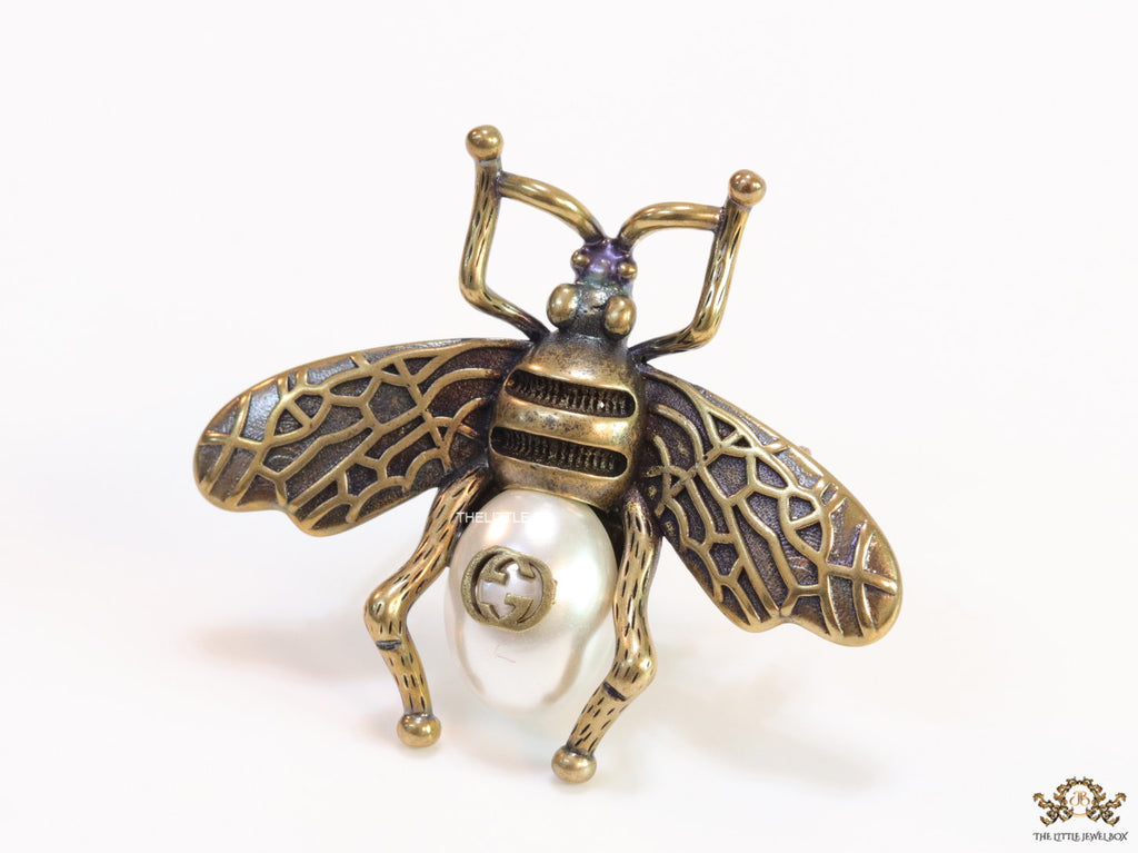 Antique gold finish alphabet bee brooch