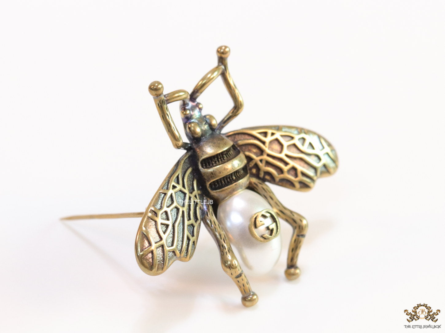 Antique gold finish alphabet bee brooch