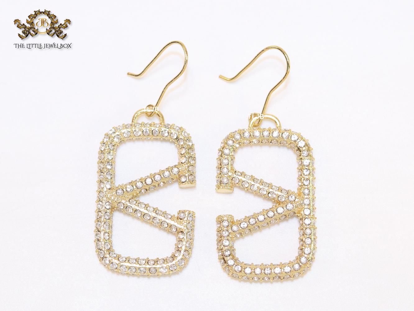 Alphabet open V cz and gold danglers