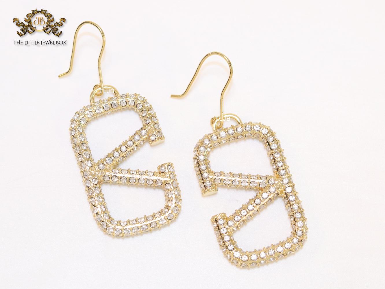 Alphabet open V cz and gold danglers