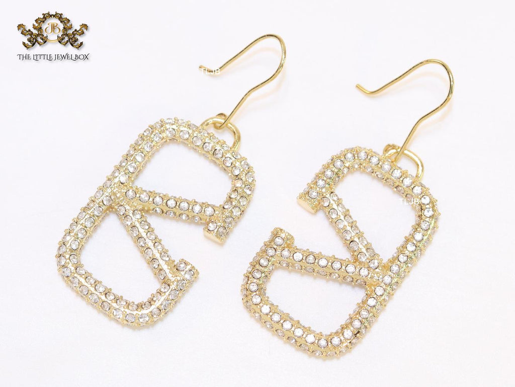 Alphabet open V cz and gold danglers