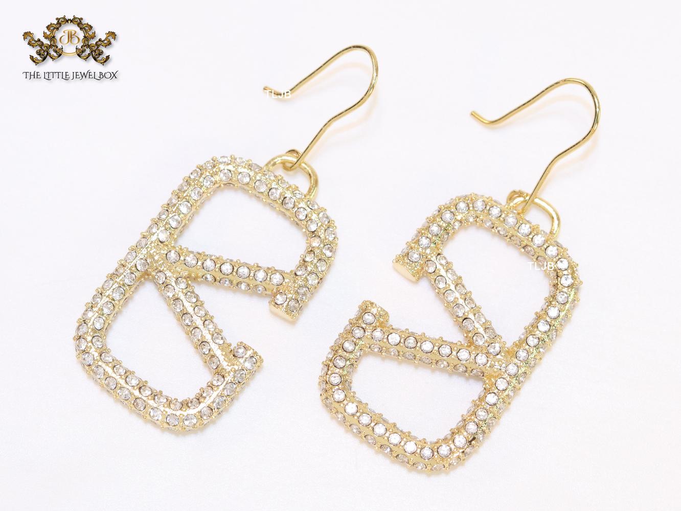 Alphabet open V cz and gold danglers