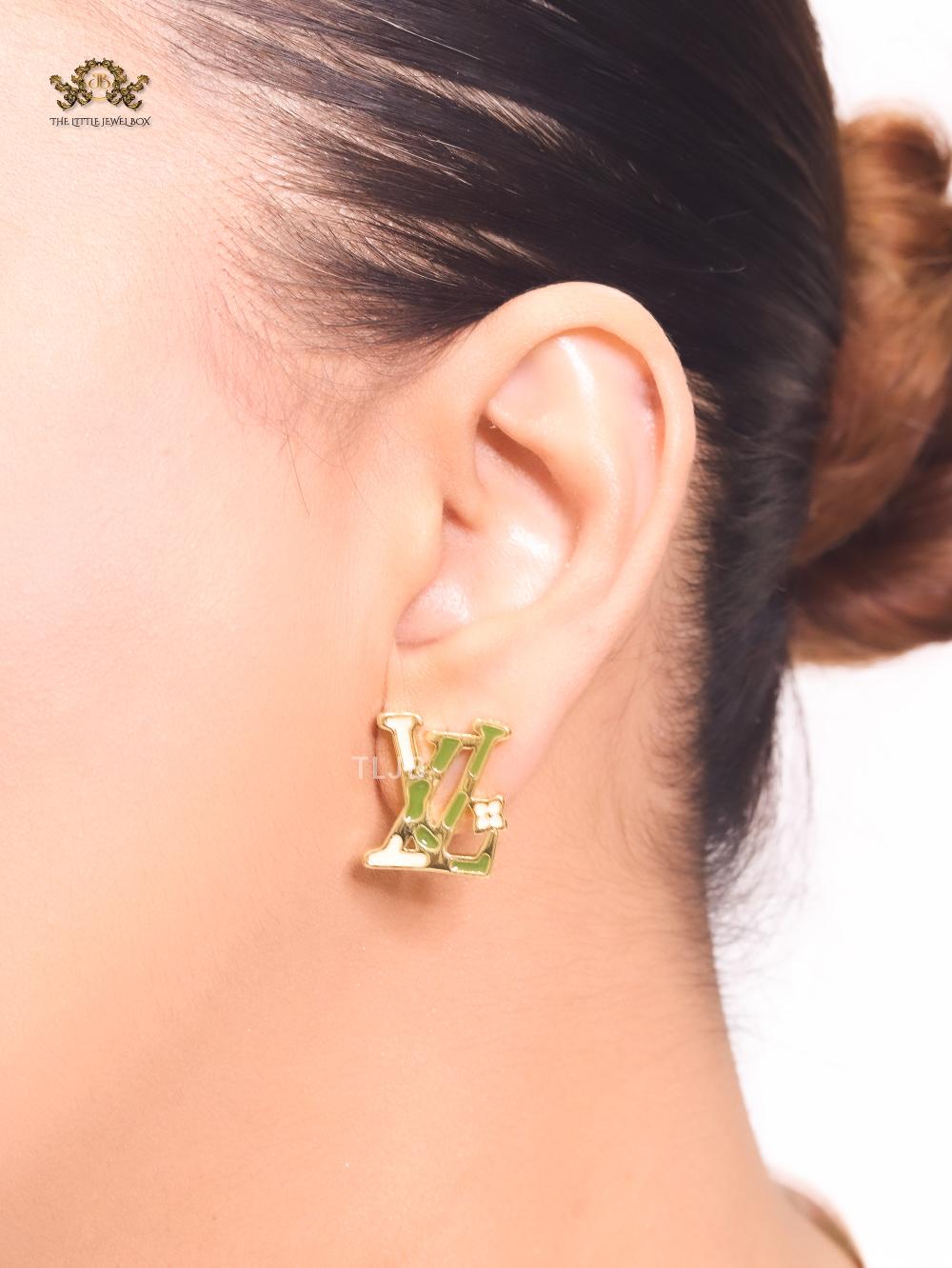 Alphabet L & V gold studs with white enamel