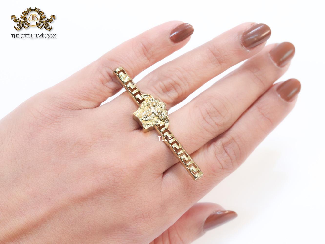 Gold plated embossed medusa statement ring
