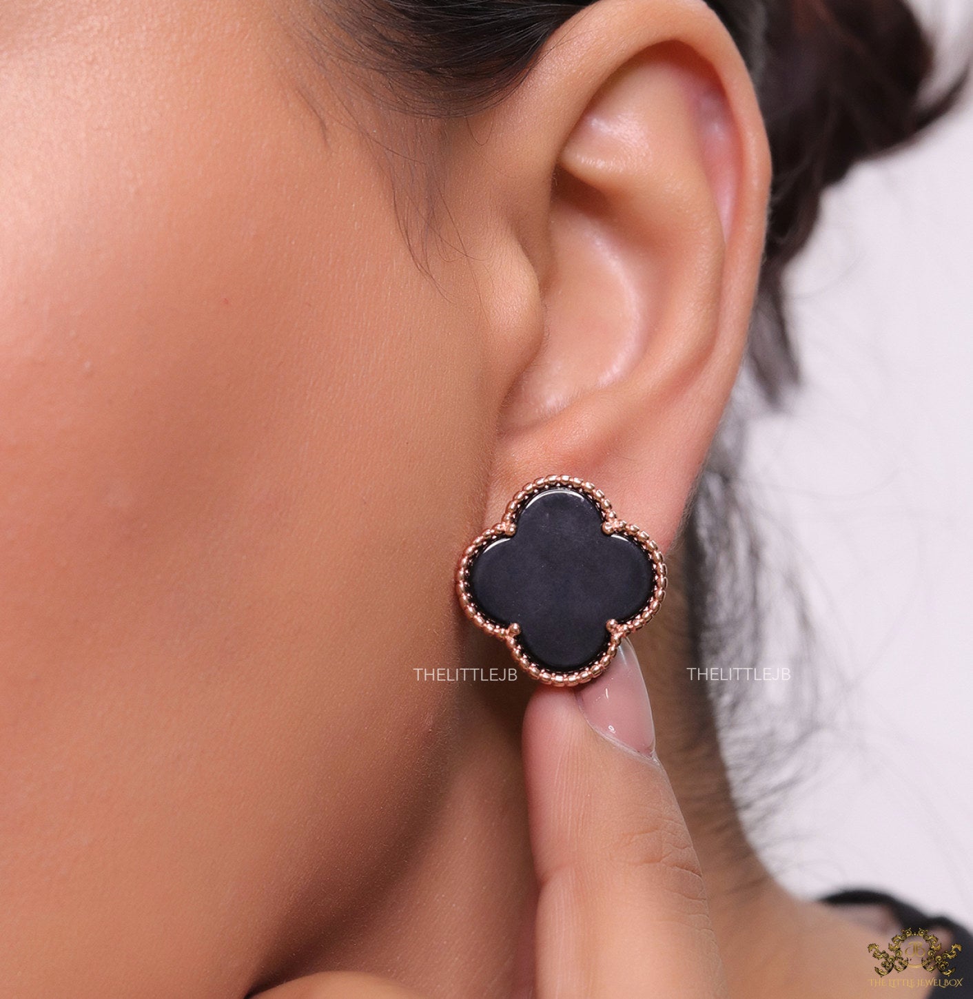 Black clover stud earrings in rose gold plating