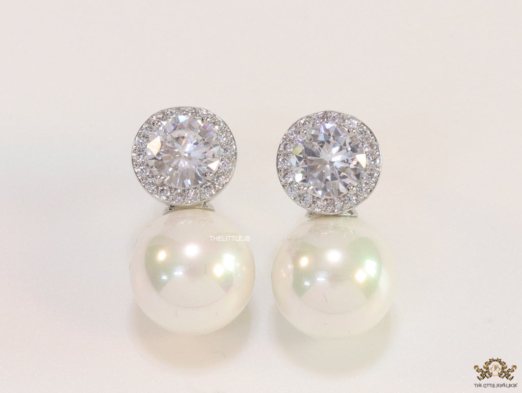 Platinum plated round cz earrings with pearl drop