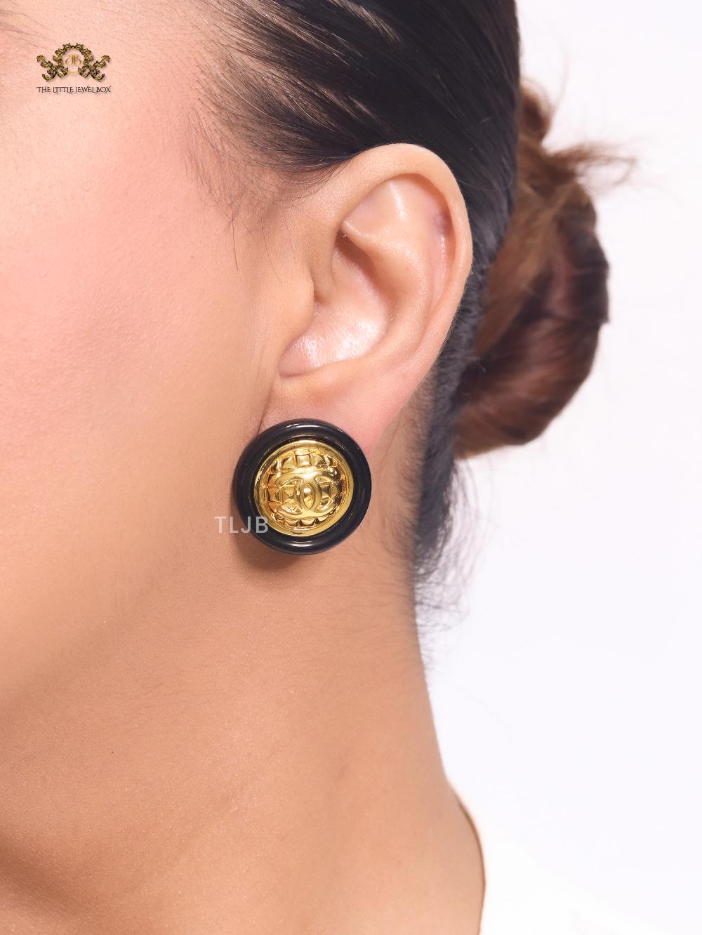Double C gold and black enamel studs