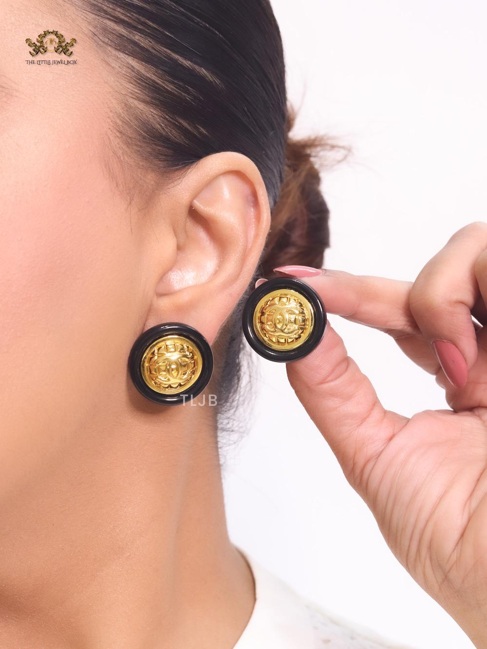 Double C gold and black enamel studs