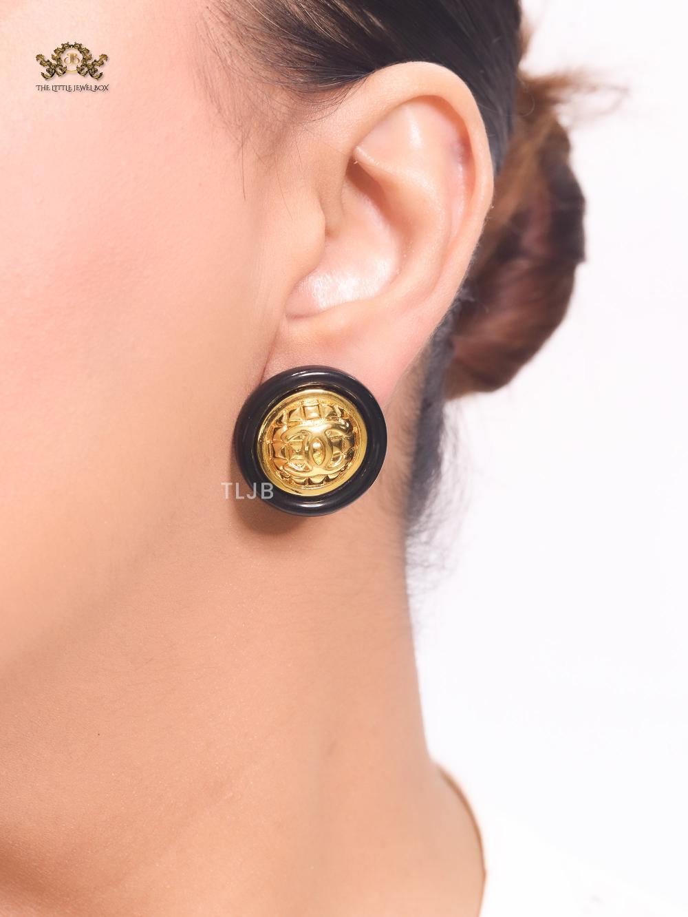 Double C gold and black enamel studs