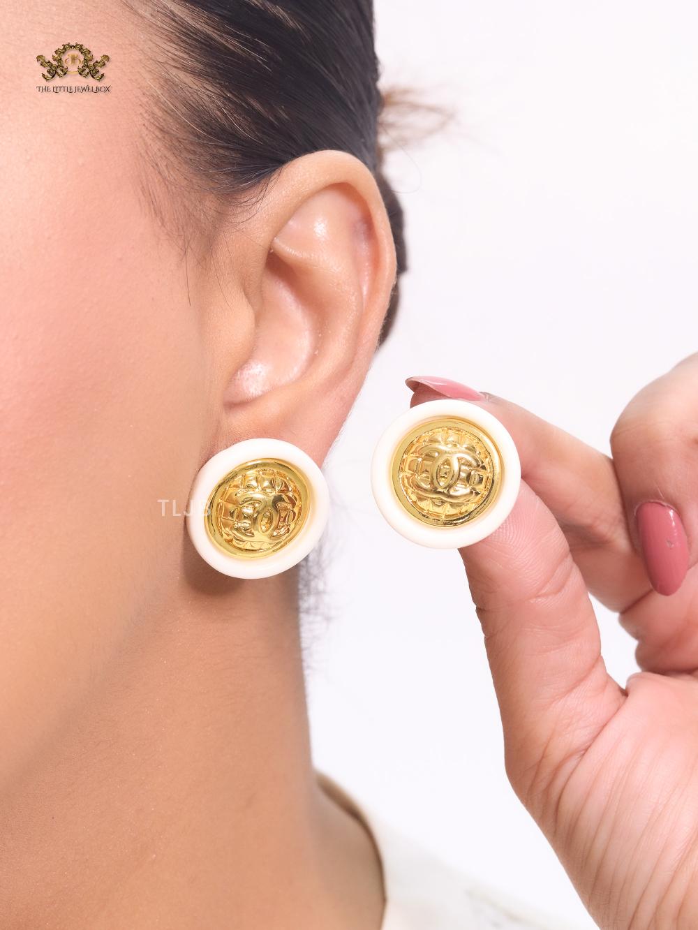 Double C gold and white enamel studs