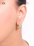 Gold serpentine hoops
