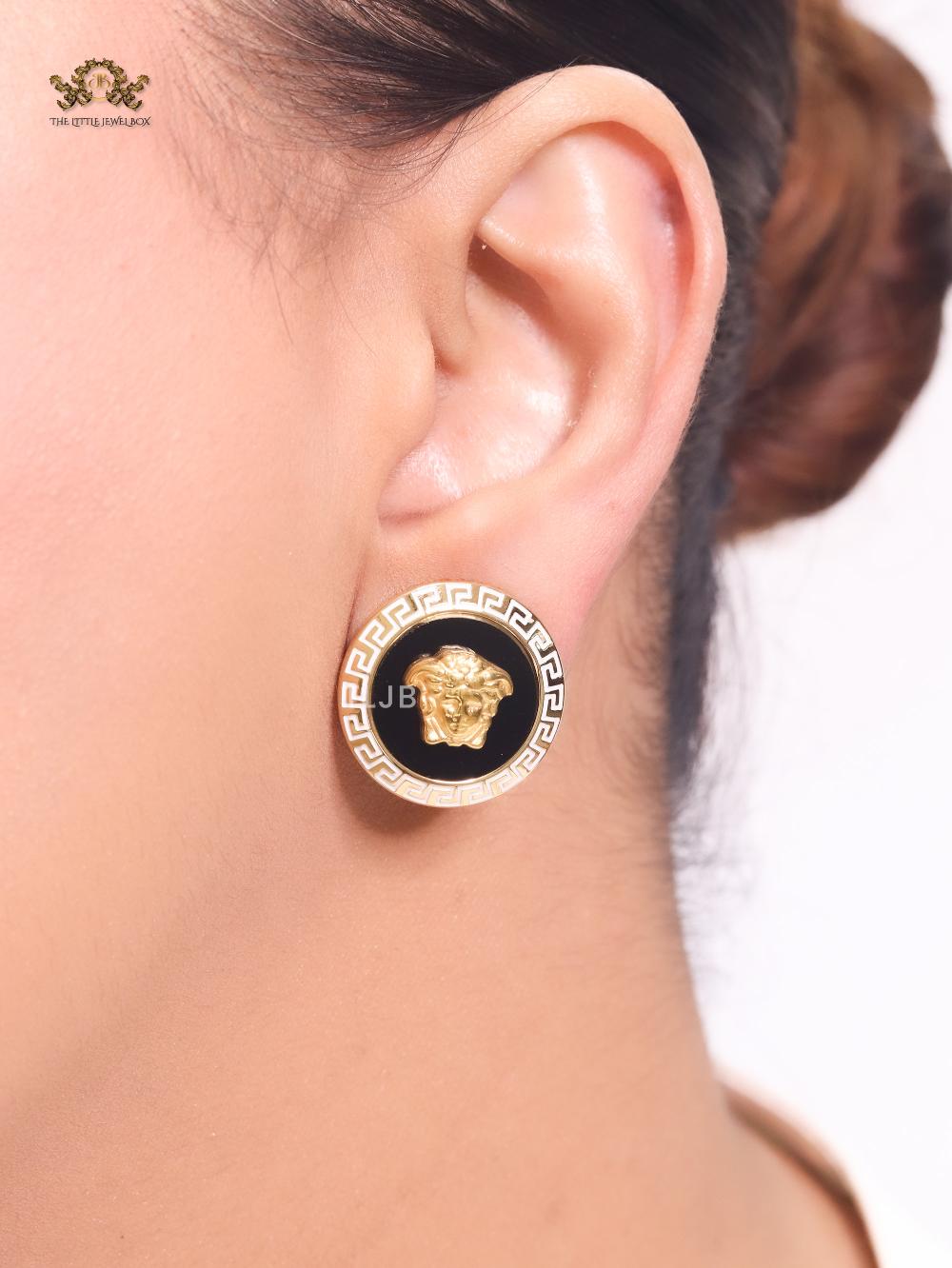Medusa black and white studs