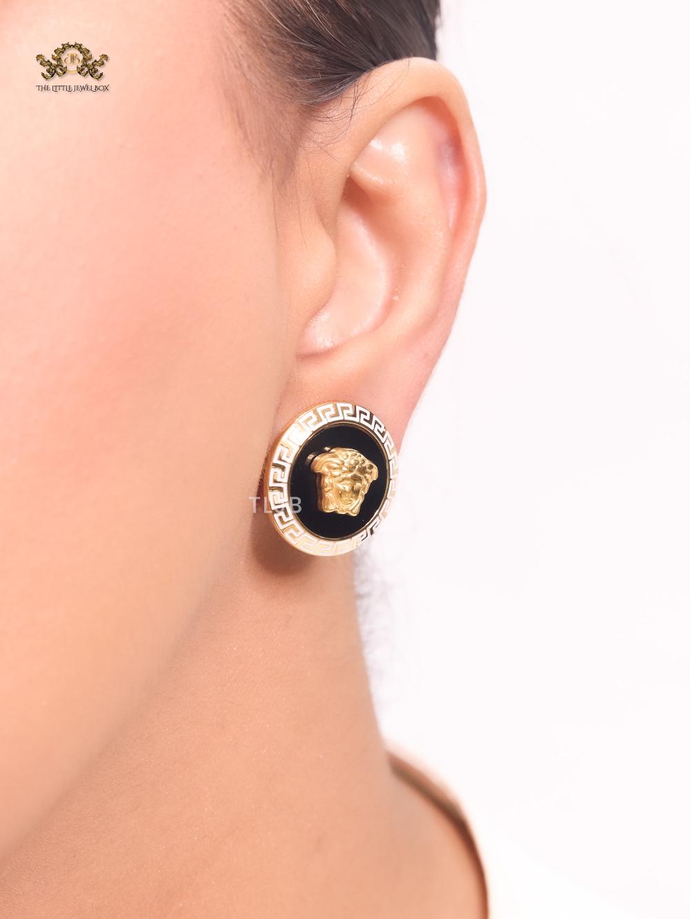 Medusa black and white studs