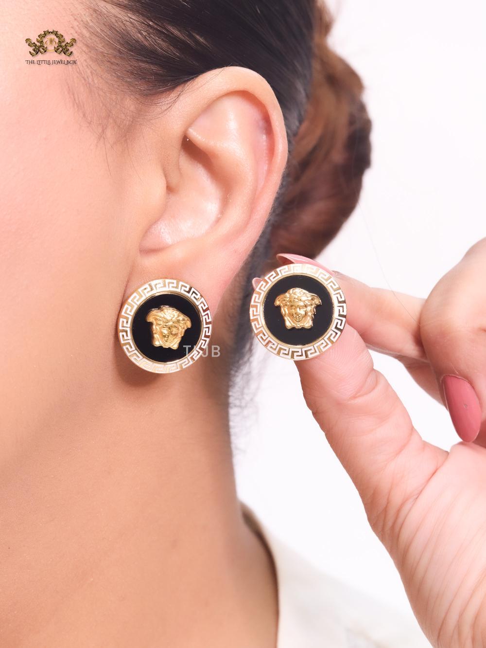 Medusa black and white studs