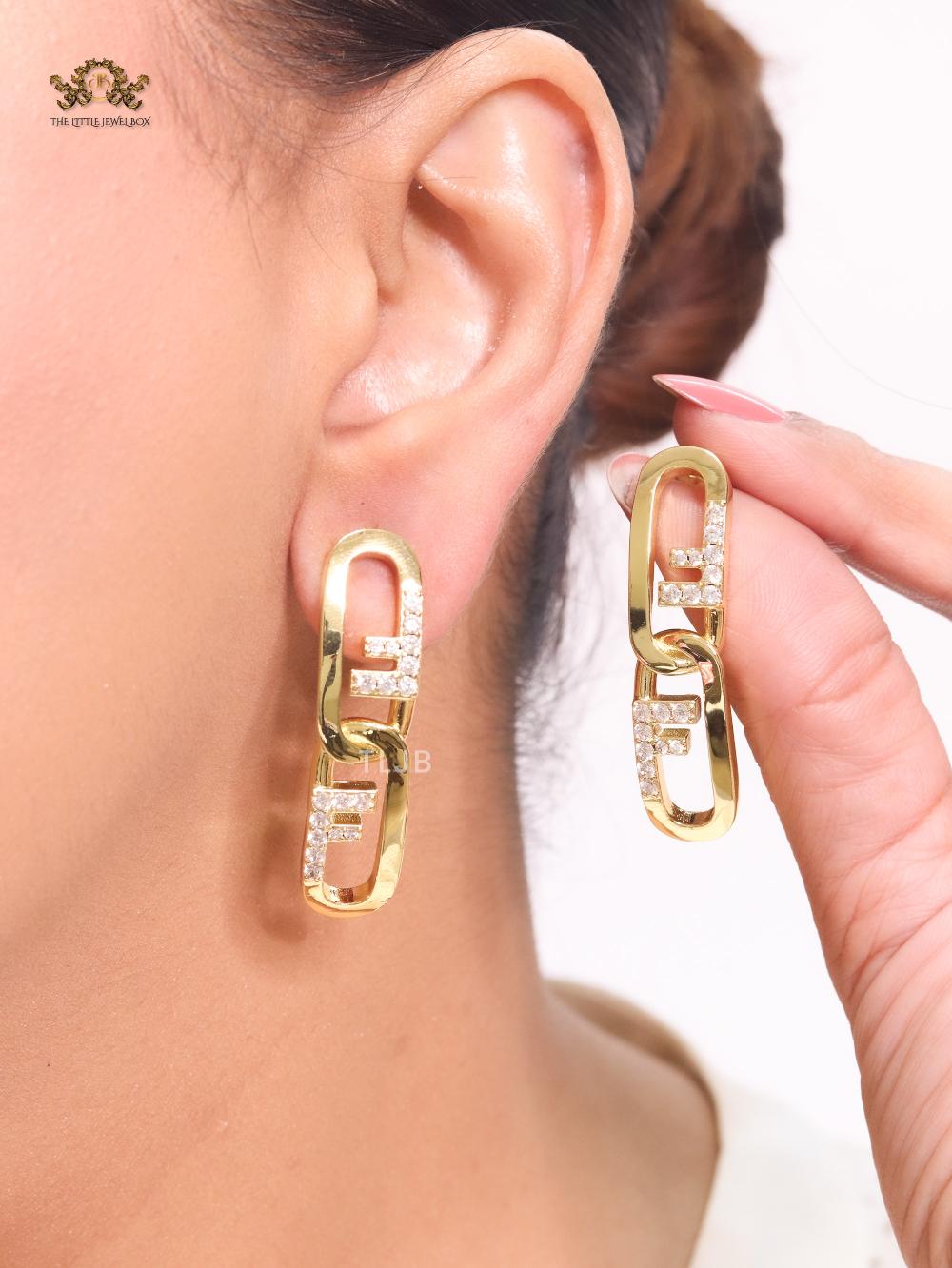 Double F cz and gold earrings