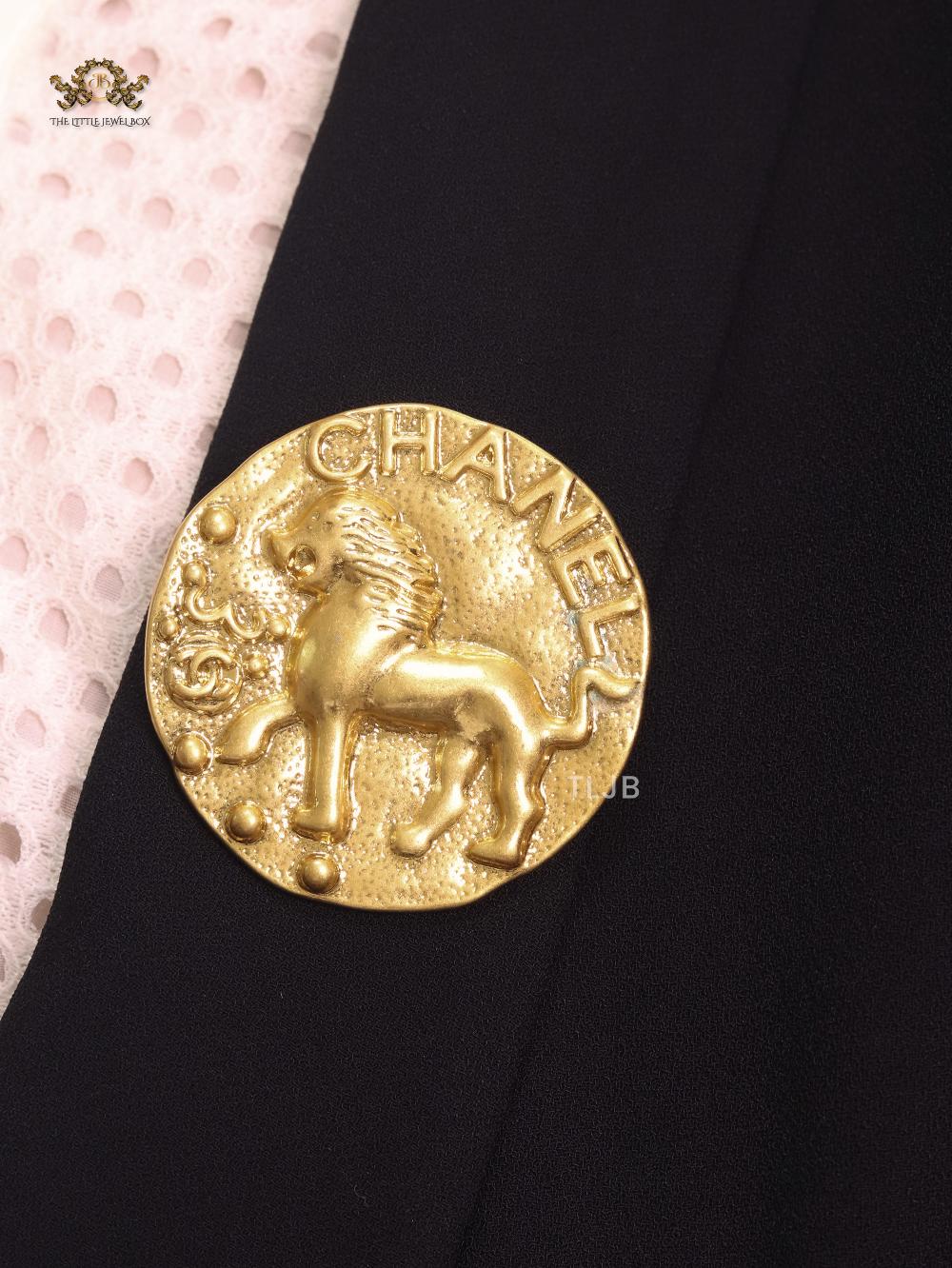 Double C embossed brooch