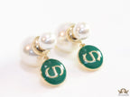Golden pearl bomber earrings with green alphabet drop