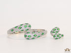 Top open platinum plated white and green cz ring
