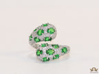 Top open platinum plated white and green cz ring