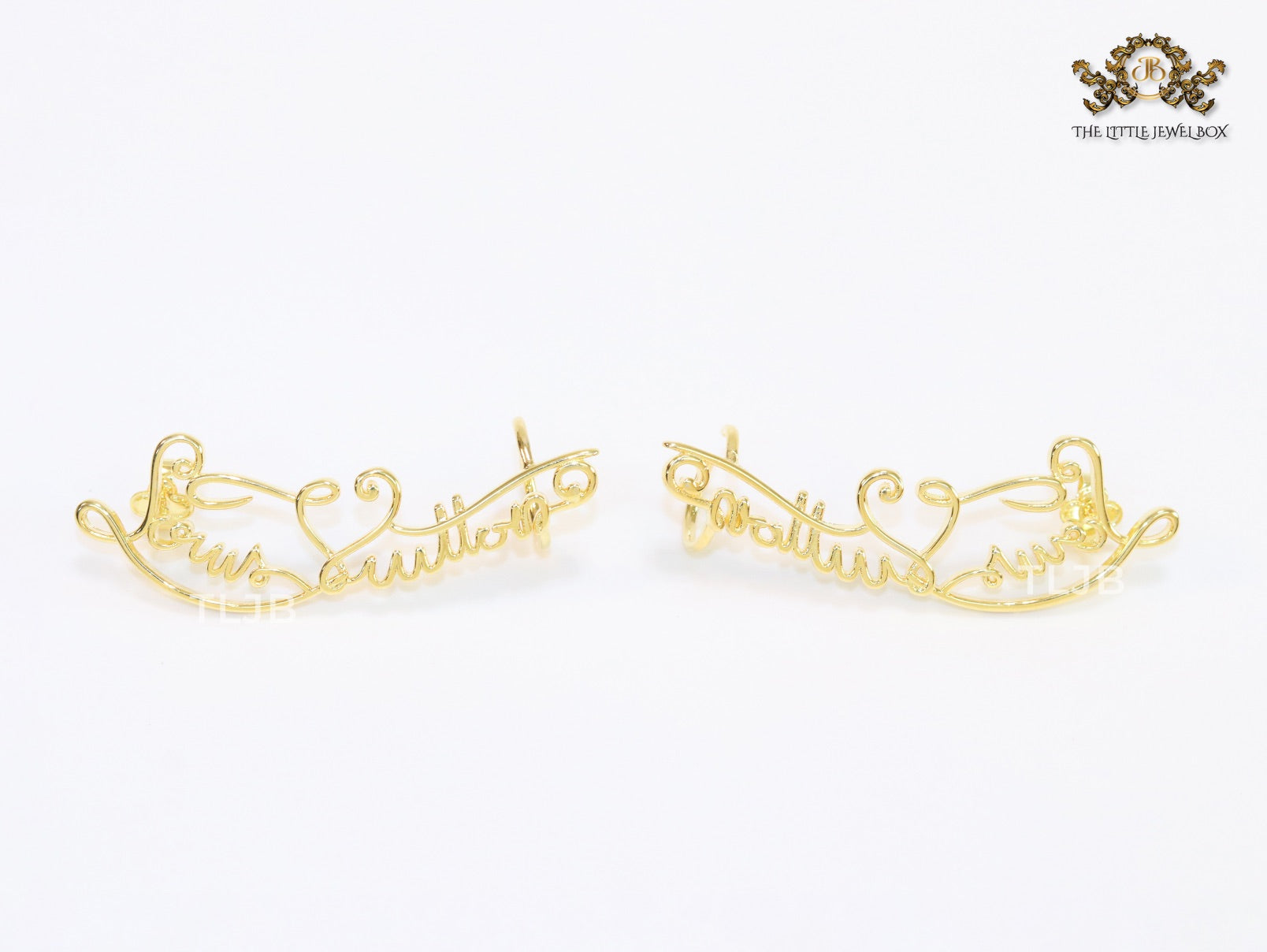 Alphabet L and V ear-cuffs in gold