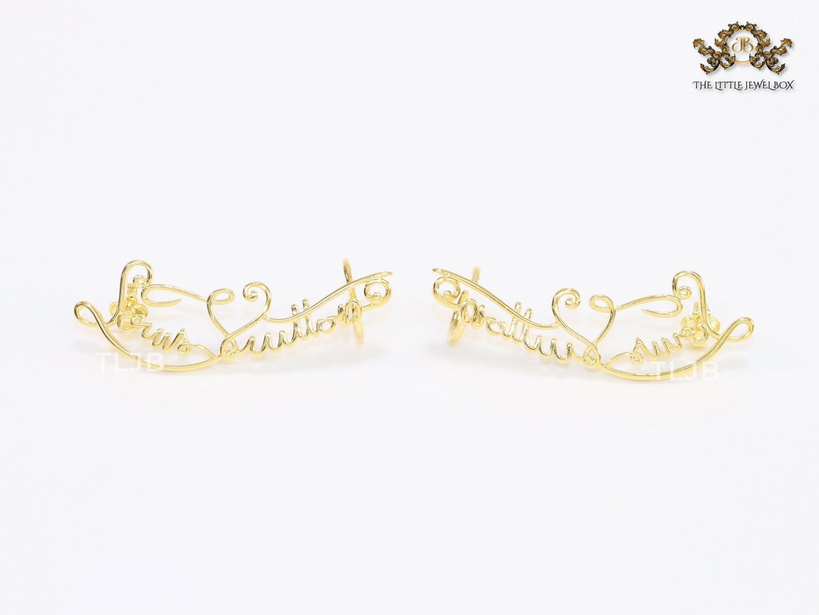 Alphabet L and V ear-cuffs in gold