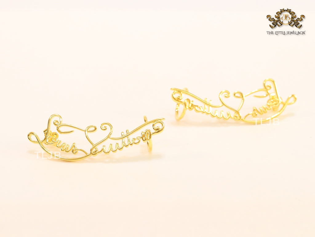 Alphabet L and V ear-cuffs in gold