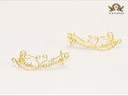 Alphabet L and V ear-cuffs in gold