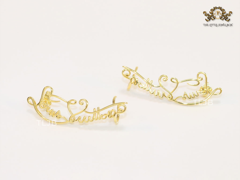 Alphabet L and V ear-cuffs in gold