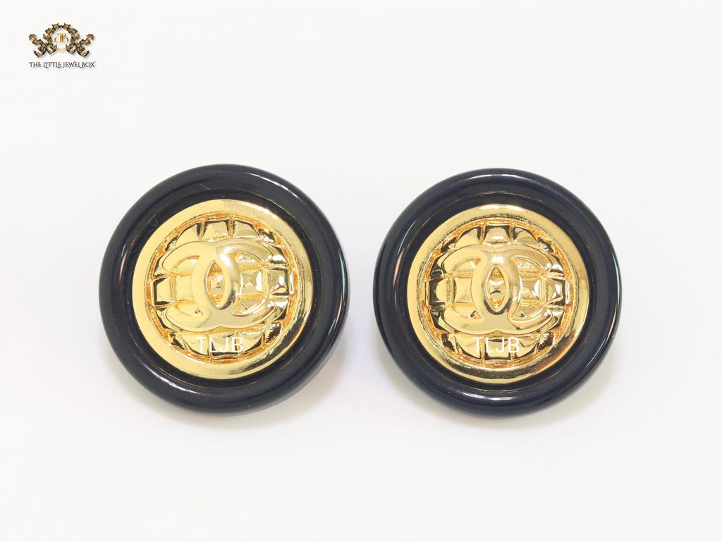 Double C gold and black enamel studs
