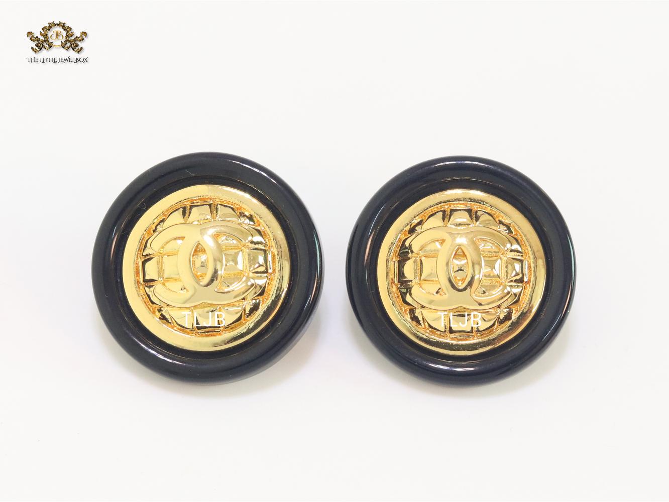 Double C gold and black enamel studs
