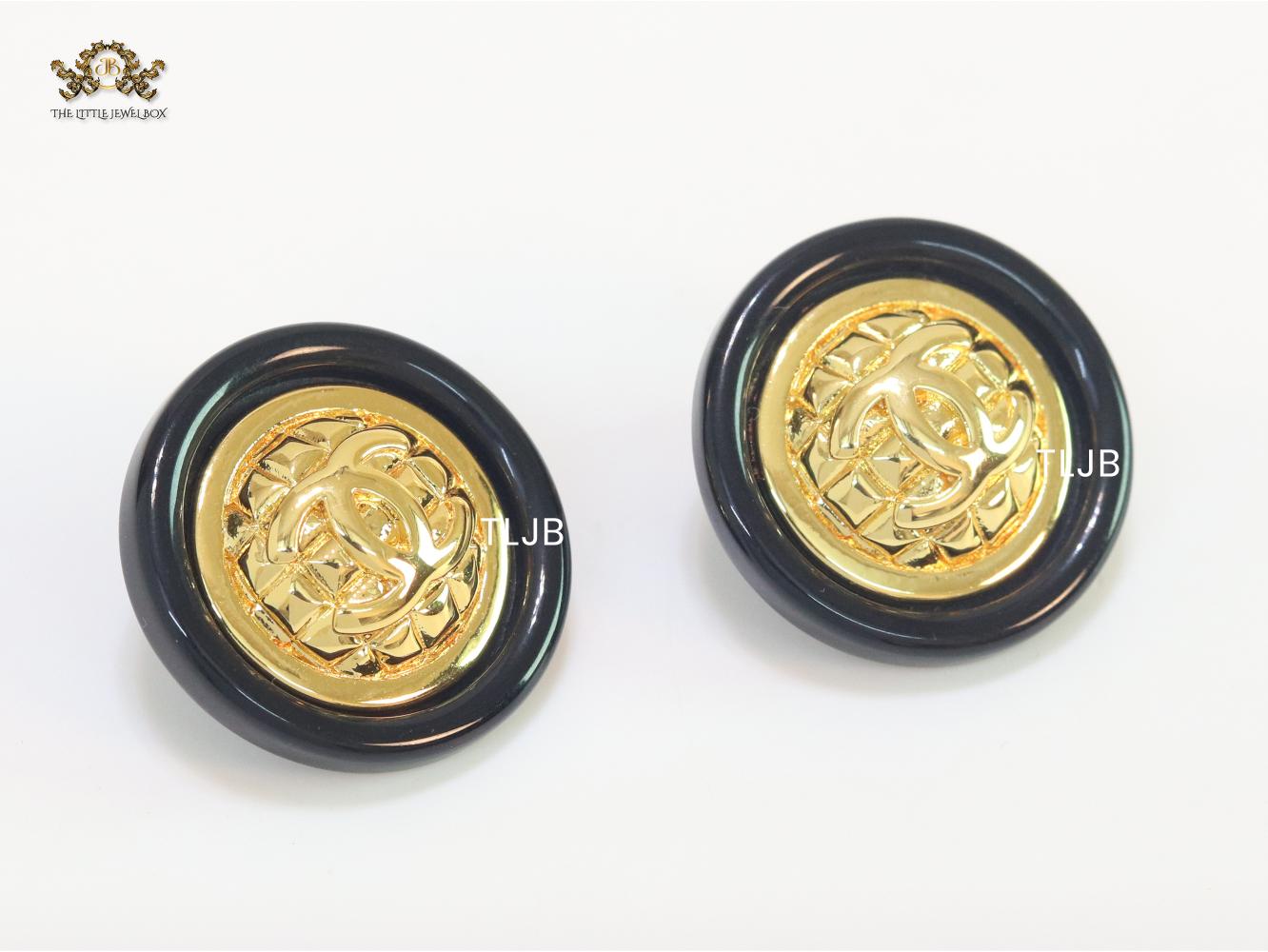 Double C gold and black enamel studs