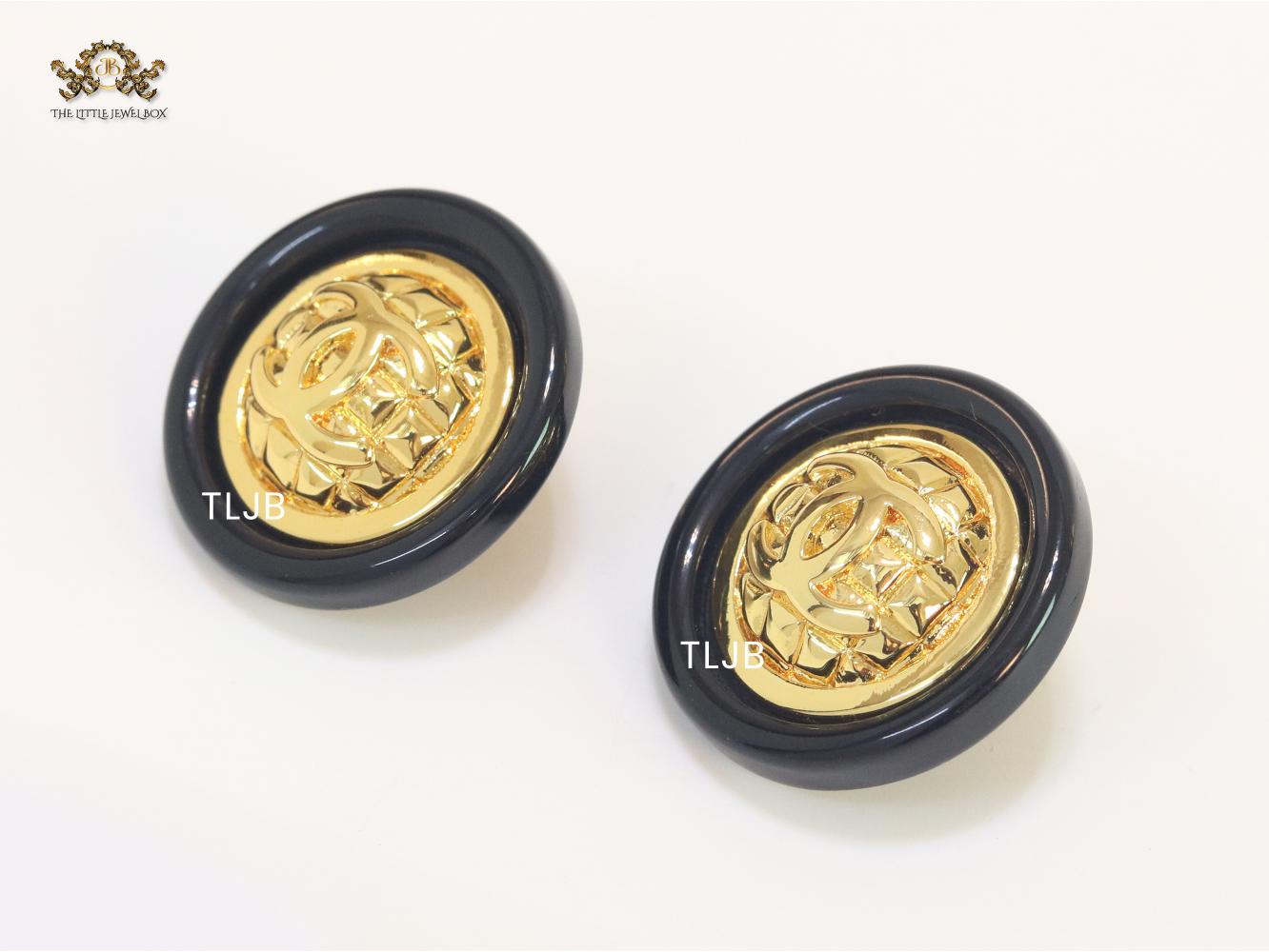 Double C gold and black enamel studs