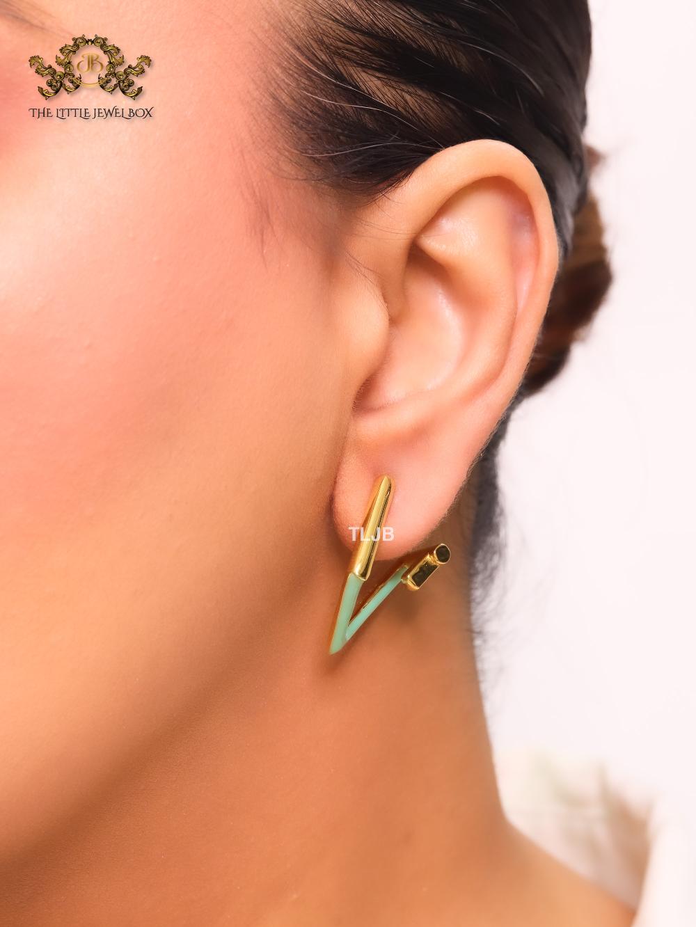 Double F & cyan enamel studs