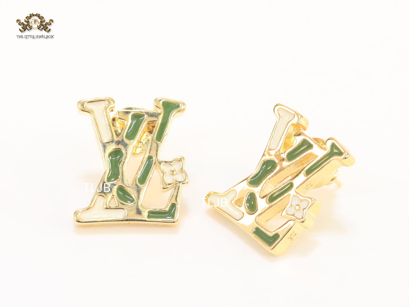 Alphabet L & V gold studs with white enamel