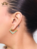 Double F & cyan enamel studs
