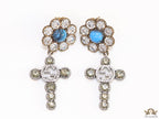Floral cz and alphabet dangles with blue stone centre