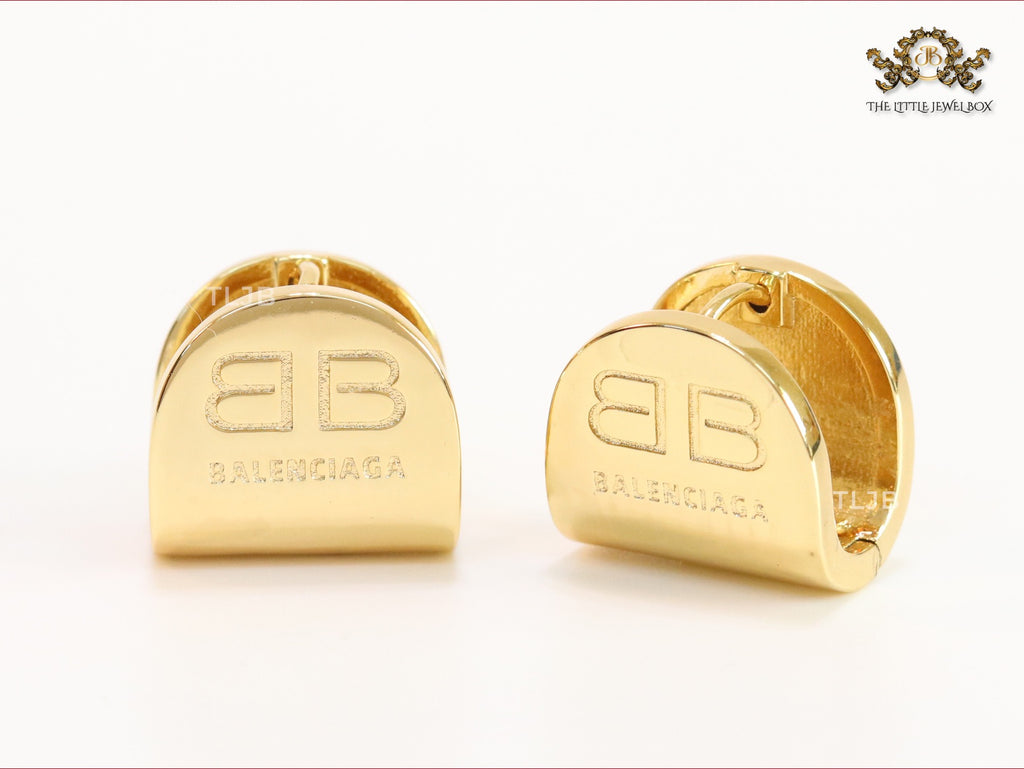 Gold double B studs