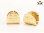 Gold double B studs