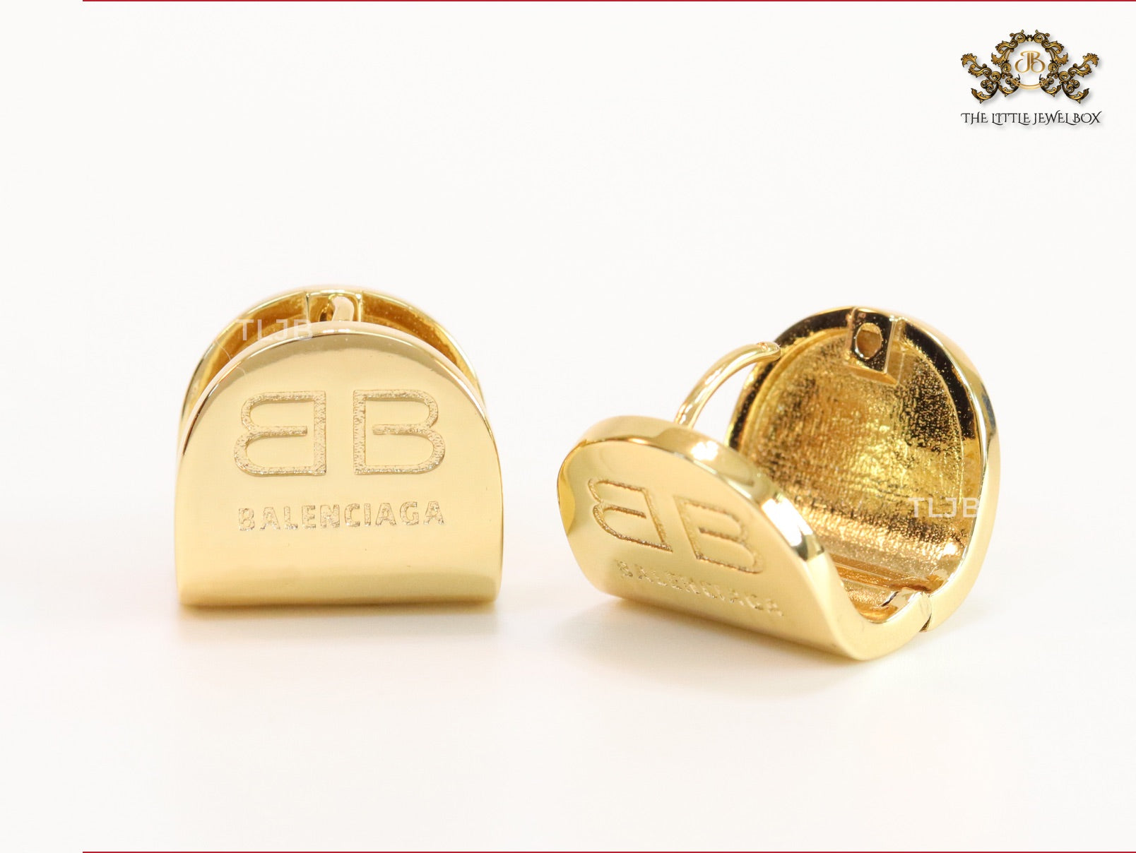 Gold double B studs